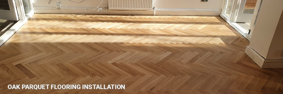 Solid Oak Parquet Floor Fitting 15 in fortis-green